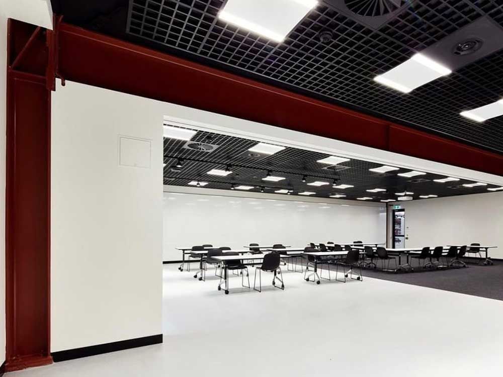 Ceiling & Support Beams ON-SITE ELECTROSTATIC SPRAY PAINTING Toyota Training Centre, Moorebank